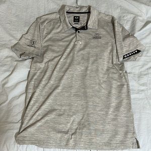 Oakley golf shirt. Travelers Championship logo and TPC River Highlands logo.